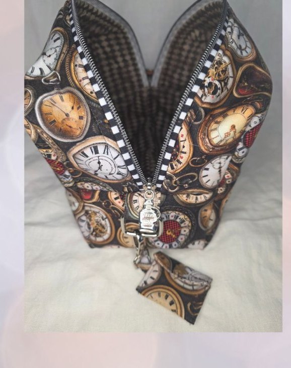 Boxy zip pouch in a pocket-watch print